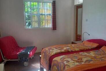 ホテル Mango Garden Cottages