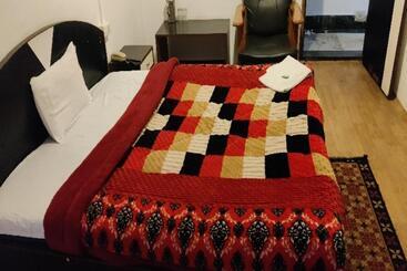 Capital O 8272 Hotel Pratigya Residency