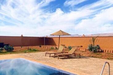 تختخواب و صبحانه Tigmi Timhar