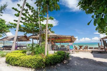 Отель The Cosy Sunset Beach Resort & Restaurant