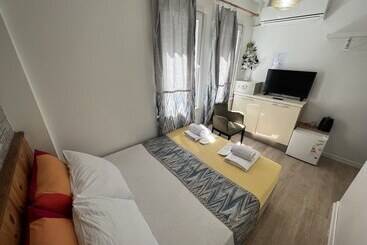 Отель Rodin Suites