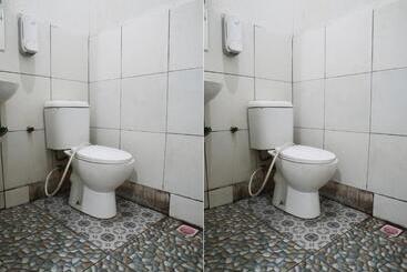 Отель Oyo 92831 Penginapan Raja