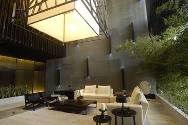 Апарт-отель Qingdao Sweetome Vacation Rentals Nalu Bay