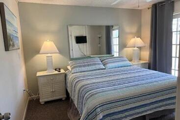 Отель Treasure Island Beach Club 727 360 7096