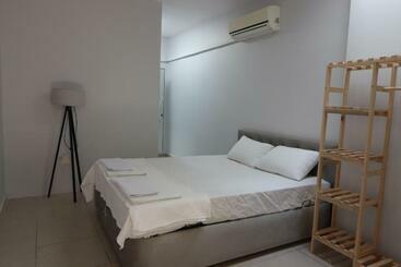 מלון כמוסות Power Suit