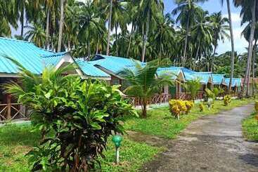 בית מלון כפרי Honeymoon Beach Resort