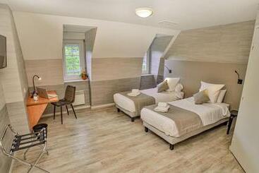 בית מלון כפרי L Hôtel Des Bains   Salles La Source