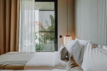 Отель The Komu Canggu Bali