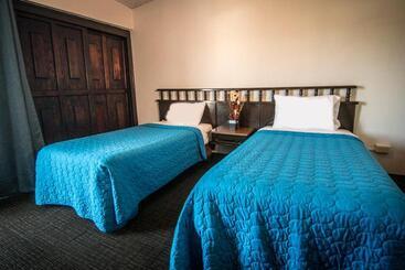 Отель Suites Malena