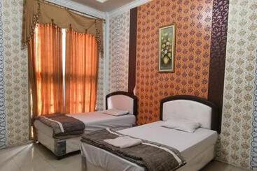 هتل Oyo 93123 Wisma Hamalau Syariah