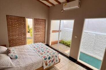 בית מלון כפרי Colonial Beach Airport