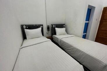 בית מלון כפרי Oyo 93311 Pesona Orange Homestay