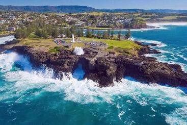 בית מלון כפרי Beachside Budget Rooms