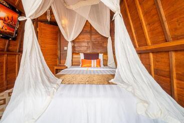 בית מלון כפרי Mai Mucuk Lumbung