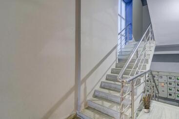 Отель Pop Tirumala Lodge