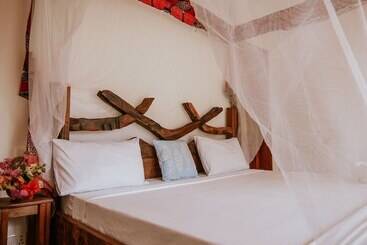 בית מלון כפרי La Playa Paradise Zanzibar