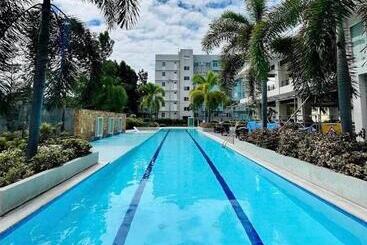 מלון דירות Forevermc Condotel