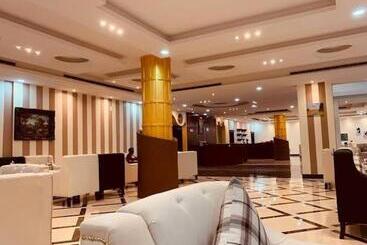 أجنحة ميثاق الفندقية