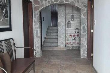 Отель Essencia Casa De Piedra