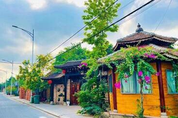 هتل Garden House Tí Nị