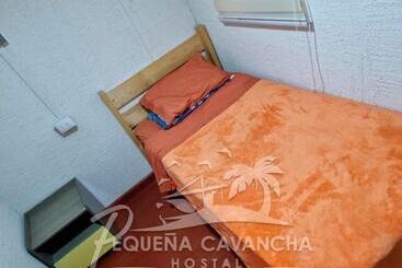 펜션 Pequeña Cavancha Hostal