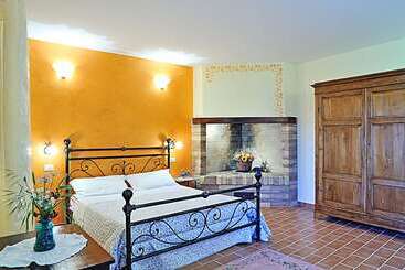 Отель Agriturismo La Buca Di Bellugi