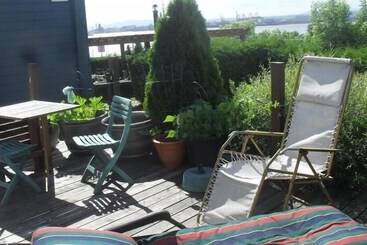 ホテル Hébergement Chez L'habitant