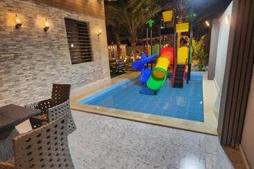 شاليه ومنتجع النخيل الريفي