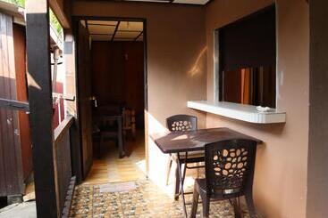 בית מלון כפרי Bushman Tioman