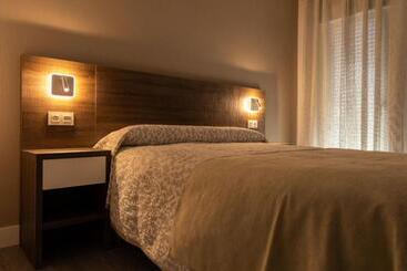 펜션 Hostal Restaurante Los Rosales