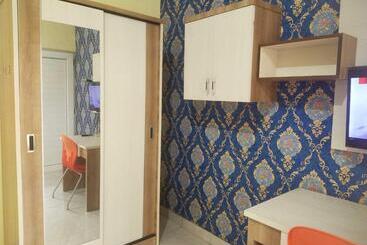 בית מלון כפרי Wisma Al Araf Syariah Mitra Reddoorz Palembang