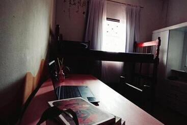 پانسیون Pueblos Hostel Latino