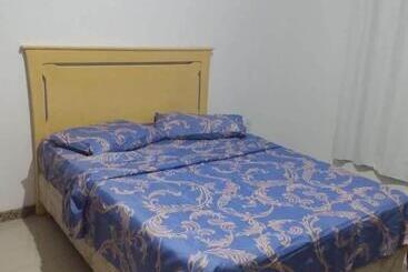 펜션 Habitacion Margareth Nobre