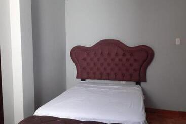 تختخواب و صبحانه Casa De Santitos