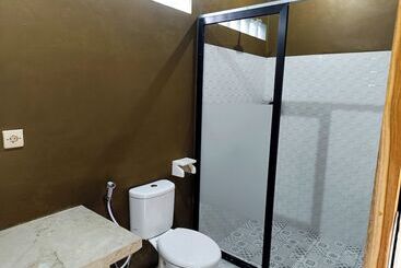 בית מלון כפרי Artomoro Bali