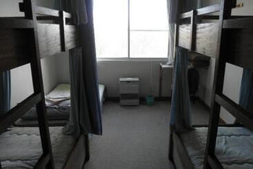 הוסטל Abashiri Ryuhyou No Oka Guesthouse