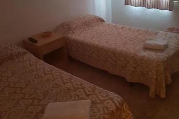 هاستل Hostal Pizzeria Oasis
