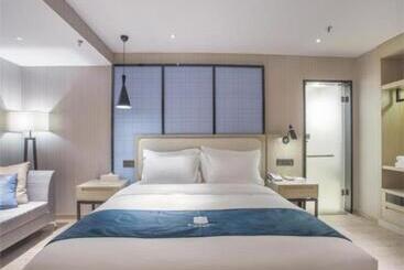 Echarm Hotel Xinyu Railway Station Baoshi Park