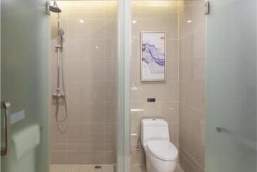 Echarm Hotel Yingshang High Speed Railway Station Wuzhou Wanhui Plaza