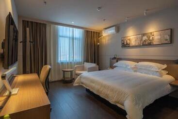 בית מלון כפרי Jinjiang Select He Ze Juan Cheng Jian She Road