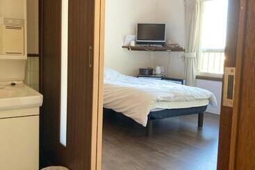 هتل おんせん民宿望海