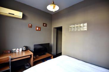 هاستل Qingdao Lejiaxuan Nostalgia Theme Inn