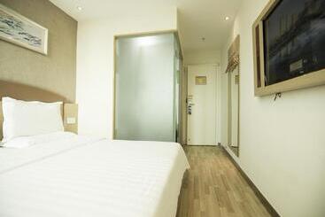 בית מלון כפרי 7days Inn Haikou Nansha Road City Square