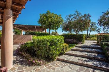 Жильё для туристов Is Molas Villas