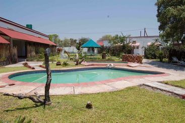 Отель Dolar Lodges & Tours