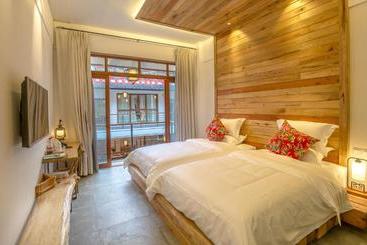 هتل Zhangjiajie Maosao Inn