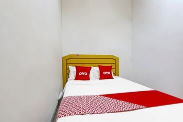 Отель Al Fatih Guest House Syariah By Oyo Rooms