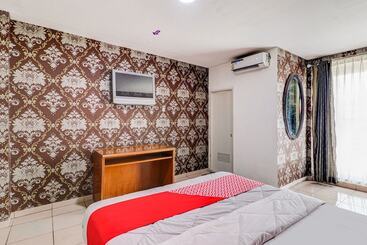 Отель Oyo 90873 Orchid Guesthouse