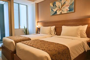 Отель Horison Suite & Residences Iswara Bekasi