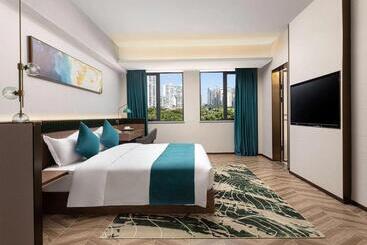 בית מלון כפרי Days Inn By Wyndham Hainan Sanya Bay